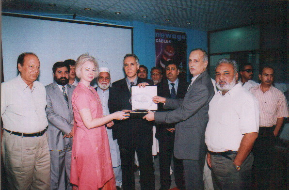 SCCI President  Amer B.Azam presenting Chamber Souvenir to Ms. Carmela Conroy, The Consul General of American Consulate